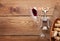 Red wine glass, corkscrew and bowl with corks
