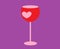 Red wine glass decorated with pink heart