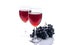 Red wine in glasses and a bunch of black grapes on a white background. Isolated composition