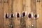 Red wine in transparent wine glasses on a wooden background. Bojole nouveau, wine bar, winery, winemaking, wine tasting concept,