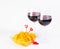 Red wine valentine glasses with peaches