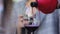 Red wine. Waiter pouring wine in glass at restaurant closeup