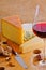 Red wineglass and cheese plate