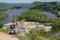 Red Wing, Minnesota - May 25, 2019: A couple of hikers sit on the Barn Bluff overlook trail to enjoy the view of the Mississippi