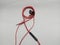 red wire earphones can be used for games and music