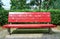 Red wooden bench in street art design on the Baltic Sea. Street bench in the spa town of Binz on the island of RÃ¼gen. Germany