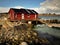 Red wooden buildings of a fishing village in Norway