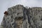 Red wooden climber house in the Lakatnik rocks and Alpine climber, Iskar river defile, Sofia province