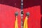 Red wooden door with metal door ring in Tibetan Buddhist monastery Arou Da Temple in Qinghai China