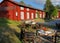 Red Wooden House In Church Town Gammelstad Near Lulea