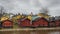 Red wooden houses on the river bank in the city of Porvoo Finland in the spring