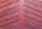 Red wooden pannels backgroubg. Retro gate background.