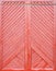 Red wooden plank door