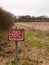 red wooden private property sign farm land no right of way no pu