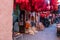 Red wool hung up to dry for sale in a souk in the Medina in Marrakesh