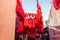 Red wool hung up to dry for sale in a souk in the Medina in Marrakesh Morocco