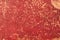 Red, worn cardboard texture background