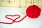 Red yarn heart design