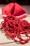 Red yarn, woolen string and beanie, knitting and crochet