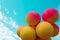 Red and yellow balls balloons on cloud sky background. Vivid holiday poster with copy space. Sunny happy day concept