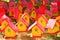 Red and yellow bird houses