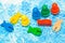 red, yellow, blue, green fish and penguin wood chips figure in children play - Board game and kids leisure concept