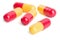 Red and yellow capsule pills isolated