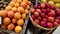 Red and yellow fresh exotic fruits in supermarket