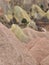 Red and yellow limestone hills in Cappadocia, Turkey