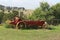 Red and yellow manure spreader