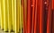 Red and yellow painted wooden rods