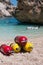 Red and Yellow Scuba Oxygen Tanks for Divers on a Beach