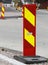 Red and yellow striped caution road sign
