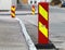 Red and yellow striped caution road signs