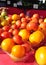 Red and yellow tomatoes at the farmers market