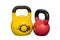 Red and yellow used and old kettlebells isolated on a white background. Workout equipment
