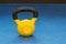 Red and yellow used and old kettlebells. Workout equipment