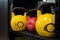 Red and yellow used and old kettlebells. Workout equipment