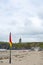 Red and yellow warning flag at ballybunion beac