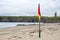 Red and yellow warning flag at beach