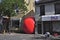 RedBall is a traveling public art piece by American artist Kurt Perschke. A RedBall was installed between two buildings in the dow