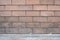 Redbrick wall with cement floor texture for background.