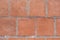 Reddish brown brick with fine grids.