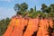 Reddish rock formations made of ocher near Rousillon village, Provence