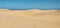 Reddish sand dunes on the island of Gran Canaria.