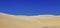 Reddish sand dunes on the island of Gran Canaria.