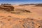 Reddish sand and rock landscapes in the desert of Wadi Rum, southern Jordan