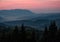 Reddish sky at dawn in mountains