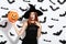 Redhaired woman with pumpkin bucket