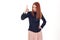 Redhead beautiful woman threatening finger